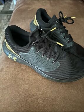 Under Armour Black with Gold Accent Athletic Trainers